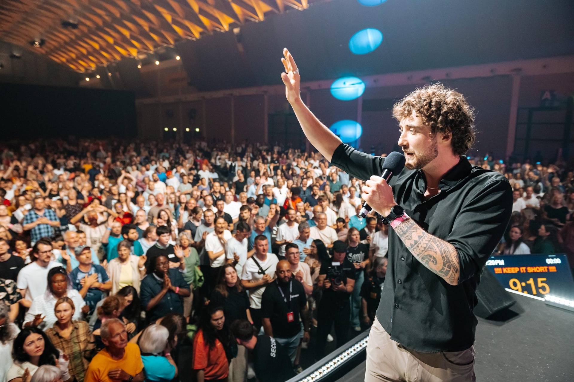 Chris preaching on a conference stage