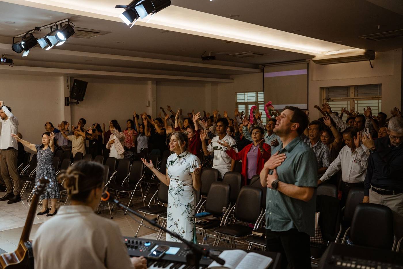A full hall worshipping at a Jesus Camp in Vietnam